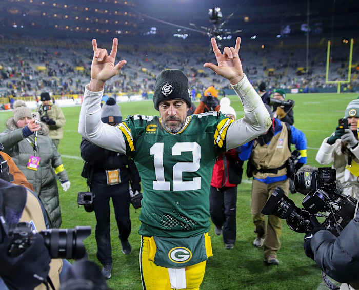 Aaron Rodgers salutes the crowd after a primetime game